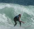 Surfing in Ipanema. Photo by Silviano courtesy of www.ipanema.com.